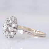 Anello a fuoco d’artificio vintage in oro bianco 18K con diamanti di taglio brillante (0.70ctw ca.), anni ‘70