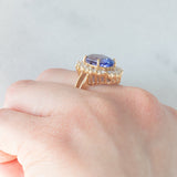 Anello ballerina vintage in oro giallo 14K con tanzanite (5.60ct ca.) e diamanti di taglio brillante e tapered (1.30ctw ca.), anni ‘70/‘80
