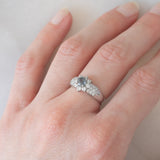 Vintage platinum daisy ring with color-change garnet (approx. 0.35ct) and diamonds (0.58ctw)