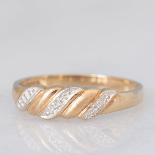 Anello vintage in oro giallo 9K con diamante e con design intrecciato, anno 1993