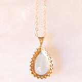 Vintage-Halskette mit Kette aus 9-karätigem Gelbgold und Anhänger aus 9-karätigem Gelb- und Weißgold mit blauem Topas (ca. 4.70 ct) und Diamanten