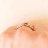 Vintage 9K yellow and white gold ring with rubies (0.20ctw approx.) and diamonds (0.03ctw approx.), 70s/80s