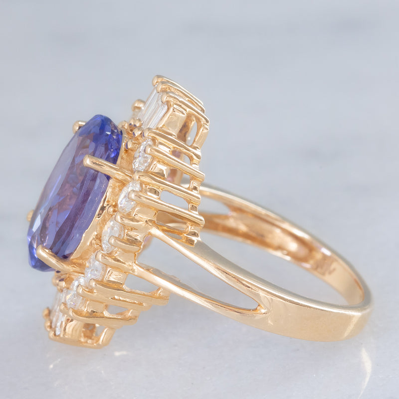 Anello ballerina vintage in oro giallo 14K con tanzanite (5.60ct ca.) e diamanti di taglio brillante e tapered (1.30ctw ca.), anni ‘70/‘80