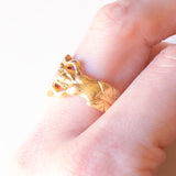 Vintage 18K yellow gold ring decorated with a shield and two mermaids, 60s