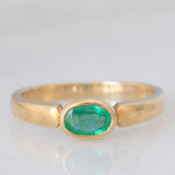 Solitario in oro giallo 9K con smeraldo (0.33ct)