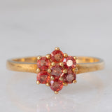 Anello a fiore in oro giallo 9K con zaffiri rossi (0.55ctw)