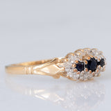 Anello vintage in oro giallo 9K con zaffiri (0.20ctw ca.) e diamanti (0.18ctw ca.), anni ‘70/‘80