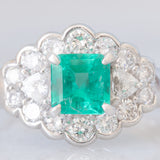 Anello a margherita vintage in platino con smeraldo colombiano (1.07ct) e diamanti (1.01ctw), anni ‘80