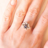 Vintage 18K white gold flower ring with sapphire (0.50ct approx.) and diamonds (0.24ctw approx.), 80s