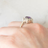 Anello a margherita vintage in oro bianco 14K con ametista (0.70ct ca.) e diamanti (0.50ctw ca.), anni ‘70
