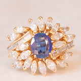 Vintage 18K yellow gold ring with sapphire (1.20ct approx.) and marquise and baguette cut diamonds (2.70ctw approx.), 70s