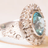 Vintage-Gänseblümchen-Ring aus 18 Karat Weißgold mit hellblauem Zirkon (ca. 4.50 ct) und Diamanten (ca. 0.84 ctw)