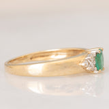 Vintage 9K yellow gold band ring with emerald (0.25ct approx.) and diamonds (0.12ctw approx.)