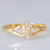Anello a fiore vintage in oro giallo 14K con diamanti di taglio brillante (0.09ctw ca.), anni ‘60/‘70