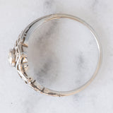 Anello Art Nouveau in oro bianco 18K con diamante di taglio vecchia miniera (0.10ct ca.), anni ‘20/‘30