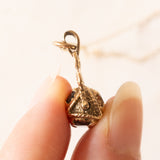 Vintage-Halskette mit drehbarem Anhänger aus 9-karätigem Gelbgold mit Quarz und Granat