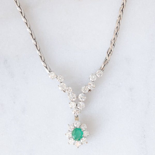 Collier vintage in oro bianco 18K con smeraldo (0.40ct ca.) e diamanti di taglio brillante (2.10ctw ca.), anni ‘80