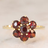 Anello a fiore vintage in oro giallo 8K con granati (1.10ctw ca.), anni ‘70