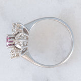 Anello a fiore vintage in oro bianco 14K con rubino (0.20ct ca.) e diamanti (0.20ctw ca.), anni ‘70