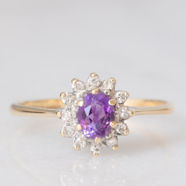 Anello a margherita in oro giallo 9K con ametista (0.35ct ca.) e diamanti (0.06ctw ca.), anno 1987