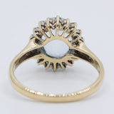 Anello a margherita vintage in oro giallo 9K con acquamarina (2ct ca.) e diamanti (0.18ctw ca.), anni 2000