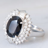 Anello a margherita vintage in platino con zaffiro (4.74ct) e diamanti (0.86ctw), anni ‘80