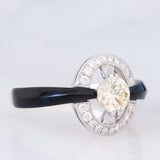 Anello vintage in stile Art Déco in platino con diamanti (centrale di 0.75ct) e onice