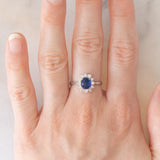 Anello a margherita vintage in platino con zaffiro (1.20ct) e diamanti (0.40ctw), anni ‘70/‘80