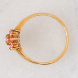 Anello a fiore in oro giallo 9K con zaffiri rossi (0.55ctw)