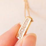 Collar vintage con cadena de oro amarillo de 18 quilates y colgante de oro amarillo y blanco de 18 quilates con diamantes talla mina antigua (aprox. 0.20 quilates), años 60/70