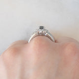 Vintage platinum daisy ring with color-change garnet (approx. 0.35ct) and diamonds (0.58ctw)