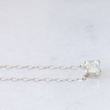 Collana vintage in platino con diamante di taglio smeraldo (0.30ct)
