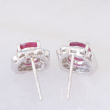 Orecchini a margherita vintage in platino con rubini (1.27ctw) e diamanti (0.50ctw), anni '80