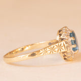 Vintage 9K yellow and white gold daisy ring with blue topaz (0.50ct approx.) and diamonds (0.08ctw approx.)