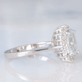 Anello a margherita in oro bianco 9K con acquamarina (1ct ca.) e diamanti di taglio brillante (0.16ctw ca.), anno 2006