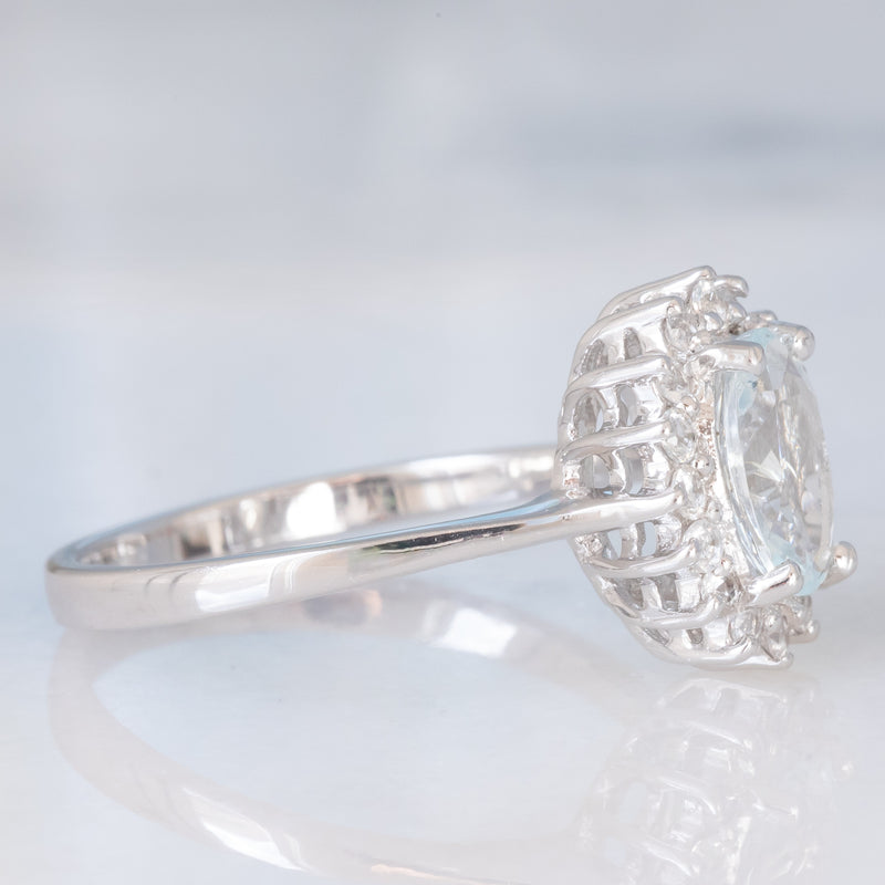 Anello a margherita in oro bianco 9K con acquamarina (1ct ca.) e diamanti di taglio brillante (0.16ctw ca.), anno 2006