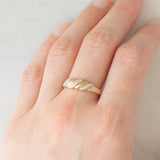 Anello vintage in oro giallo 9K con diamante e con design intrecciato, anno 1993