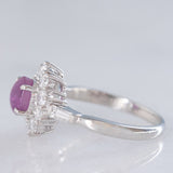 Anello a margherita vintage in platino con rubino stellato (1.35ct) e diamanti (0.66ctw ca.), anni ‘90