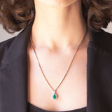 Halskette aus 18-karätigem Weißgold mit Smaragd (ca. 1.20 ct) und Diamanten im Brillantschliff (ca. 0.58 ctw)