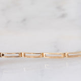 Braccialetto semirigido retrò in oro giallo 14K a argento con zaffiro (1ct ca.) e diamanti di taglio rosetta (0.36ctw ca.), anni ‘40/‘50