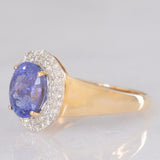 Anello a margherita vintage in oro giallo e bianco 14K con tanzanite (2.10ct ca.) e diamanti (0.30ctw ca.), anni ‘80