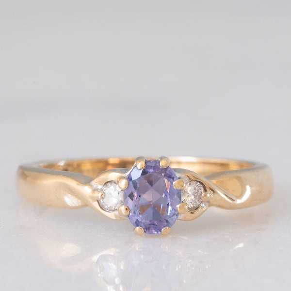Trilogy vintage in oro giallo 9K con tanzanite (0.35ct ca.) e diamanti di taglio brillante (0.05ctw ca.), anni ‘90
