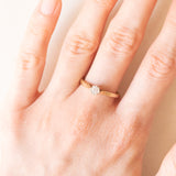 Solitärring aus 9 Karat Gelb- und Weißgold mit Diamant im Brillantschliff (ca. 0.10 ct), 70er Jahre