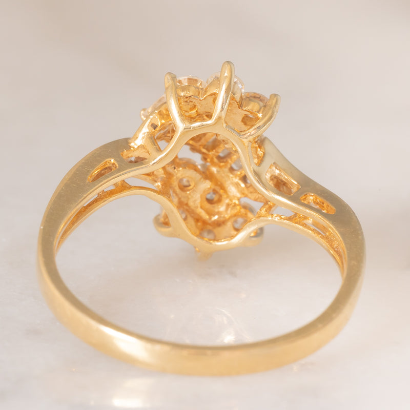 Anello vintage in oro giallo 14K con diamanti di taglio brillante e di taglio baguette (0.75ctw ca.), anni ‘70/‘80