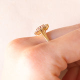 Anello a margherita vintage in oro giallo e bianco 14K con tormalina rosa (0.50ct ca.) e diamanti (0.08ctw ca.), anni ‘70