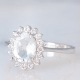 Anello a margherita in oro bianco 9K con acquamarina (1ct ca.) e diamanti di taglio brillante (0.16ctw ca.), anno 2006