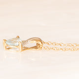 Vintage-Halskette mit Kette aus 9-karätigem Gelbgold und Anhänger aus 9-karätigem Gelb- und Weißgold mit blauem Topas im Herzschliff (ca. 0.60 ct), ca. 90er Jahre.