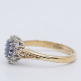 Anello a margherita vintage in oro giallo 9K con zaffiro (0.36ct ca.) e diamanti (0.12ctw ca.), anno 1989