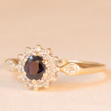 Vintage 9K yellow and white gold daisy ring with sapphire (0.40ct approx.) and diamonds (0.14ctw approx.)