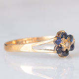 Anello a fiore vintage in oro giallo 9K con zaffiri (0.30ctw ca.) e diamante, anno 1977